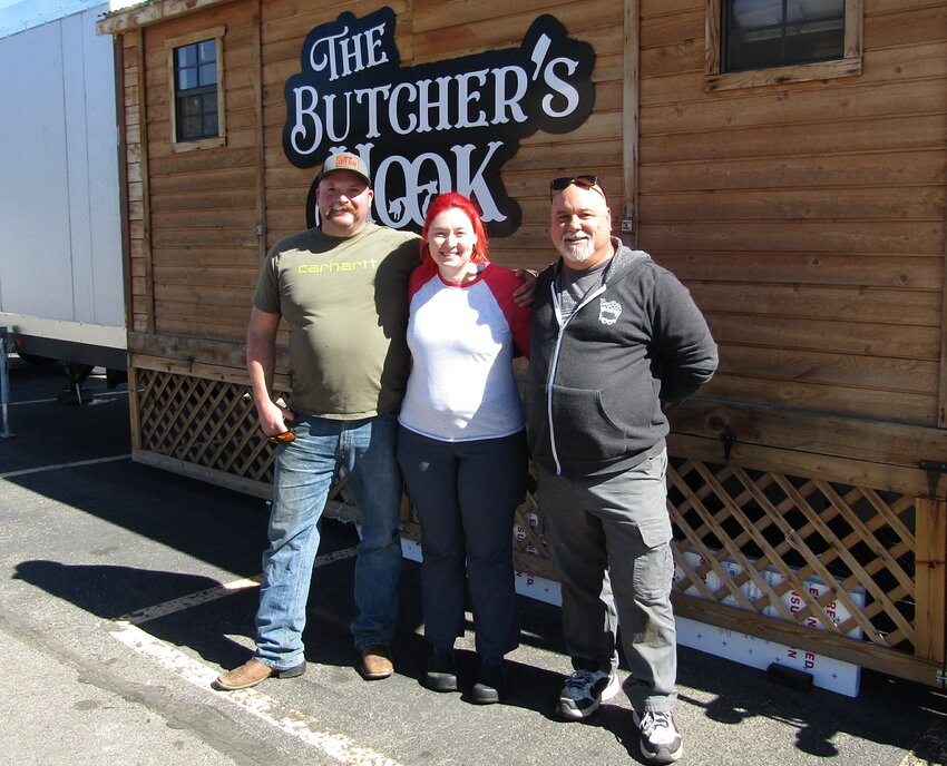 From left, Evan Jeffries, Cora Gains and Robert Bruso are ready to help you find that perfect cut of meat at The Butcher’s Hook.